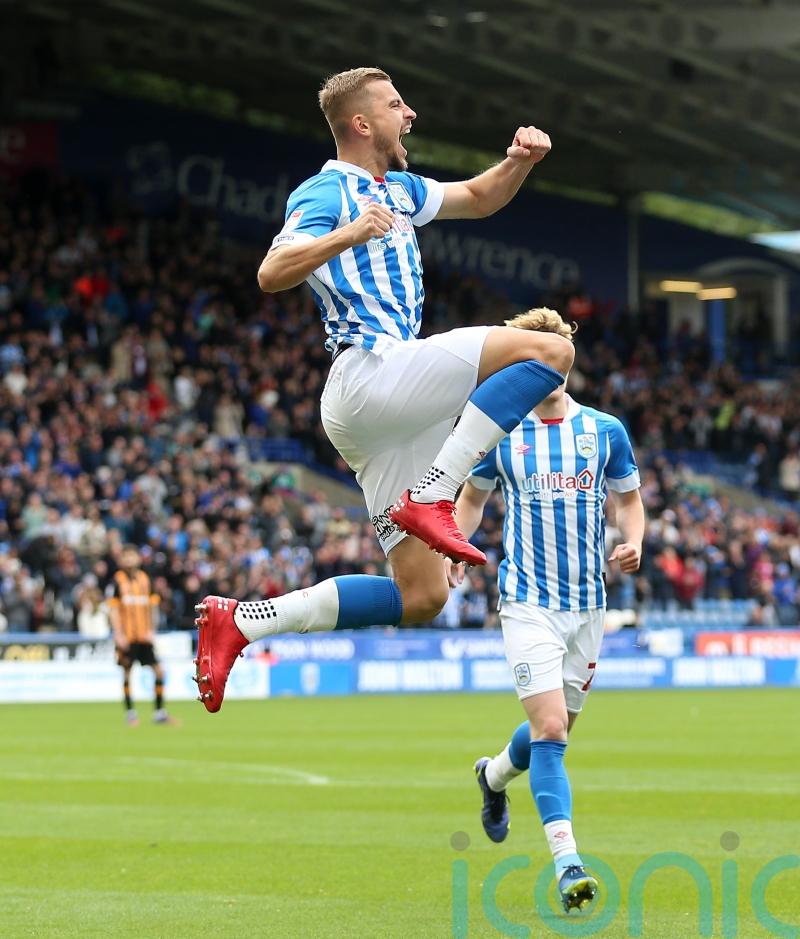 Michal Helik on target as Huddersfield hand Mark Fotheringham win on home debut