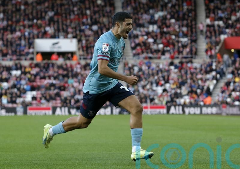 Anass Zaroury heads late winner as leaders Burnley edge comeback against Reading