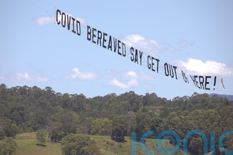 Covid campaigners fly plane with 35ft banner over I'm A Celeb jungle