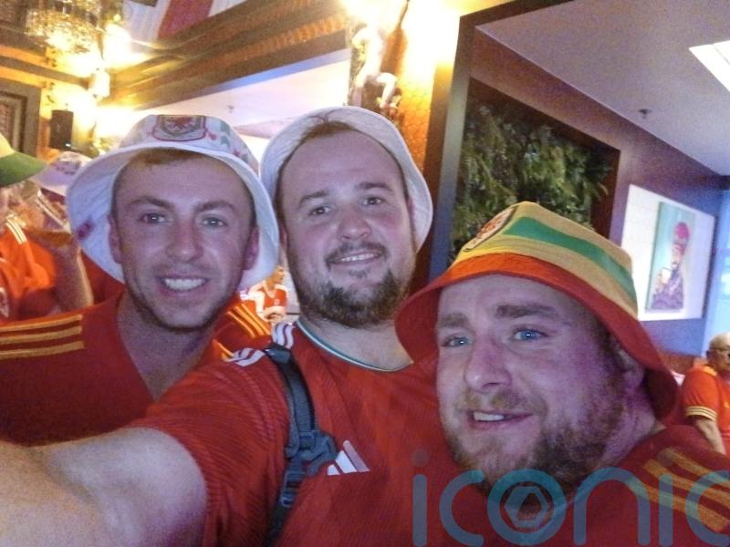Fan flies last minute to watch Wales in World Cup &ndash; without telling girlfriend