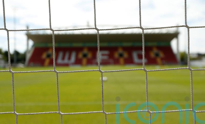 York win at Woking despite new manager&rsquo;s absence