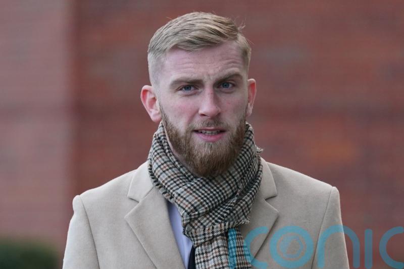 Sheffield United striker Oli McBurnie acquitted of pitch invasion assault