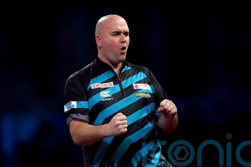 Rob Cross sees off Scott Williams to reach World Championship third round