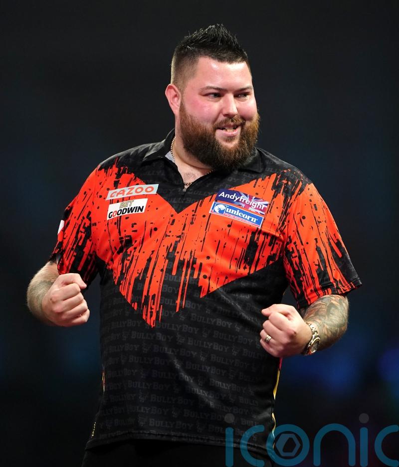 World champion Michael Smith kicks off Bahrain Darts Masters with victory
