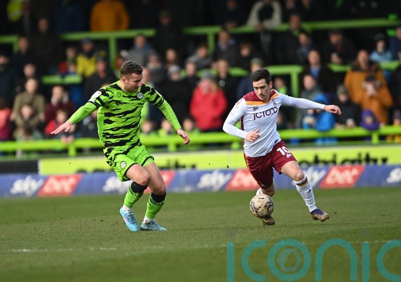 AFC Wimbledon share spoils with 10-man Bradford