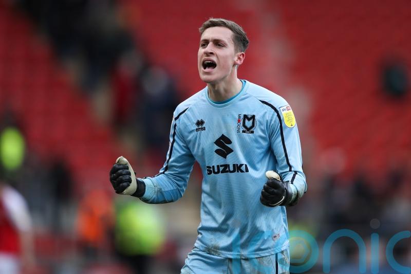 Jamie Cumming &lsquo;quality&rsquo; kept MK Dons alive in Lincoln stalemate