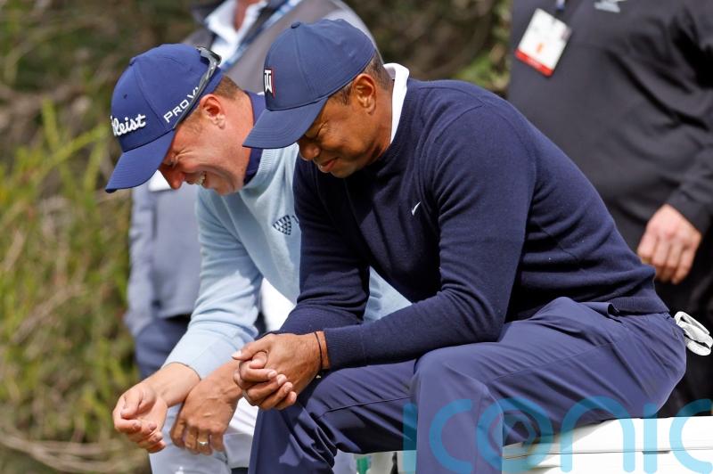 Tiger Woods gives tampon to playing partner Justin Thomas after outdriving him