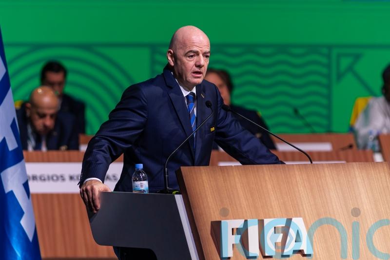 FIFA president hits out at &lsquo;mean&rsquo; critics and gets four more years in the job