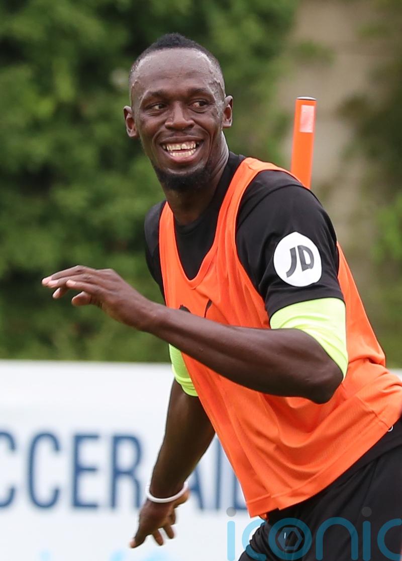 Usain Bolt asks Lauren Hemp for shirt after watching Man City beat Chelsea