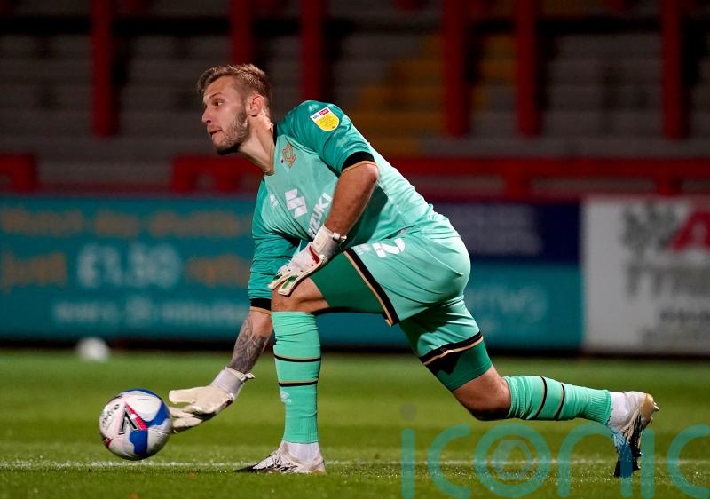 Laurie Walker stars with two penalty saves as Barnet draw with Woking