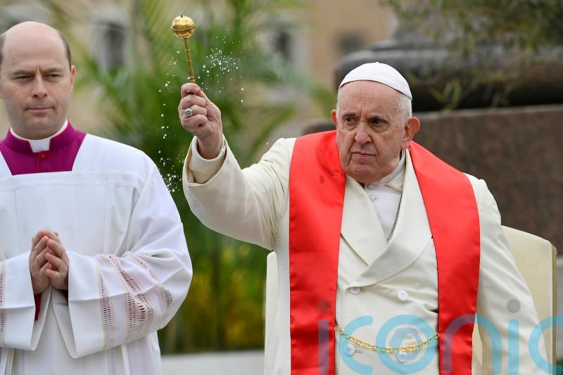 Pope Francis battled hoarse voice during Palm Sunday mass after bout of bronchitis