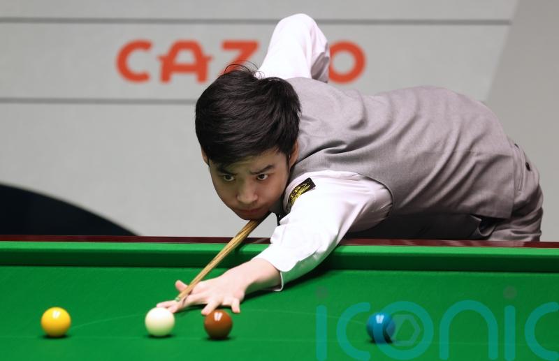 Si Jiahui eases into quarter-finals with victory over Robert Milkins