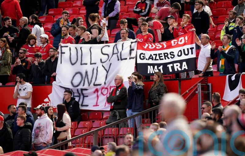 Man Utd fans stage protest against Glazers before and during Aston Villa match