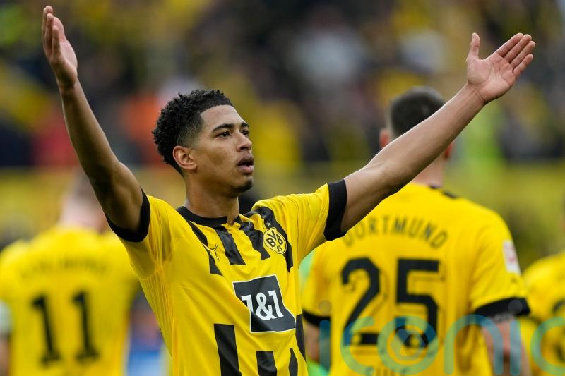 Jude Bellingham nets double as Borussia Dortmund keep up title pursuit