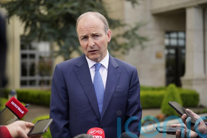 Government must act with coherence, Martin insists as he moves to cool tensions