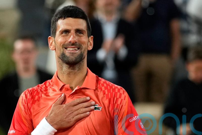 Novak Djokovic keeps focus on court to see off Marton Fucsovics at French Open