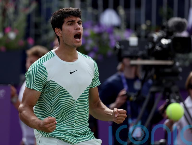 Carlos Alcaraz issues Wimbledon warning as he finds his feet on grass