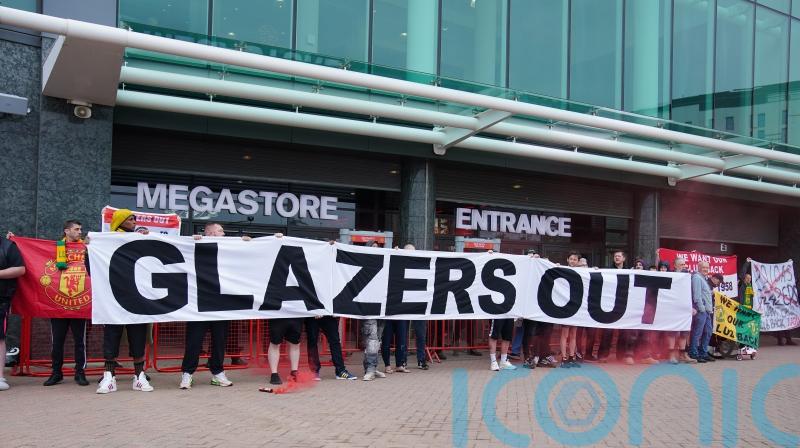 Manchester United fans block megastore entrance in protest against Glazer family