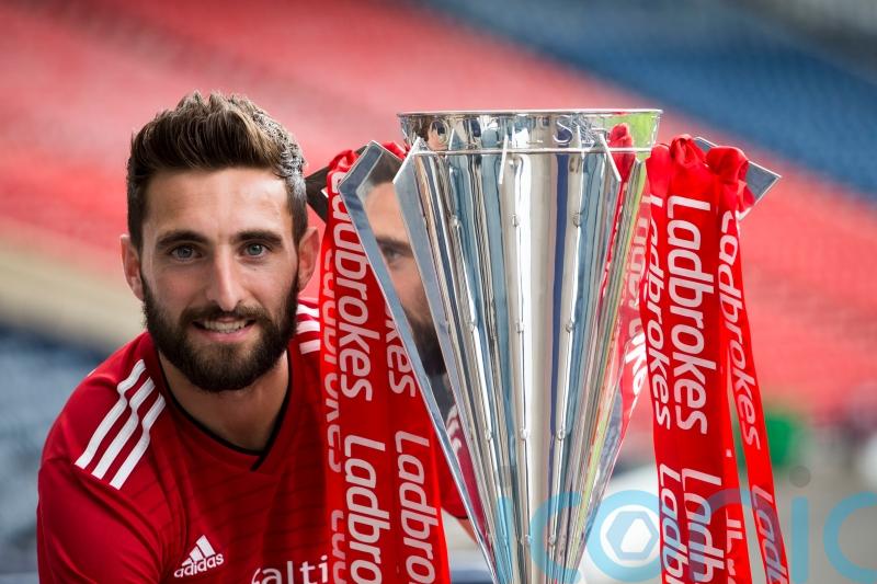 Graeme Shinnie &lsquo;back home again&rsquo; after returning to Aberdeen on three-year deal