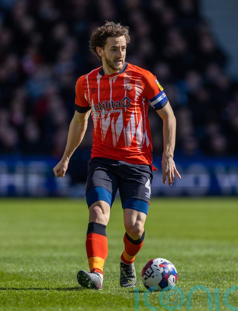 Tom Lockyer agrees new Luton deal after making full recovery from heart scare