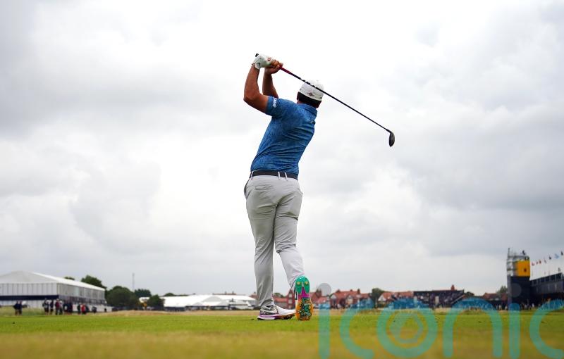 Early starters battle overcast conditions as Tommy Fleetwood shares Open lead