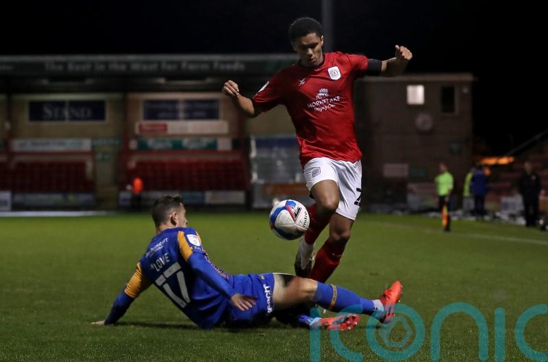 Crewe fight back from two down to earn point against 10-man Mansfield