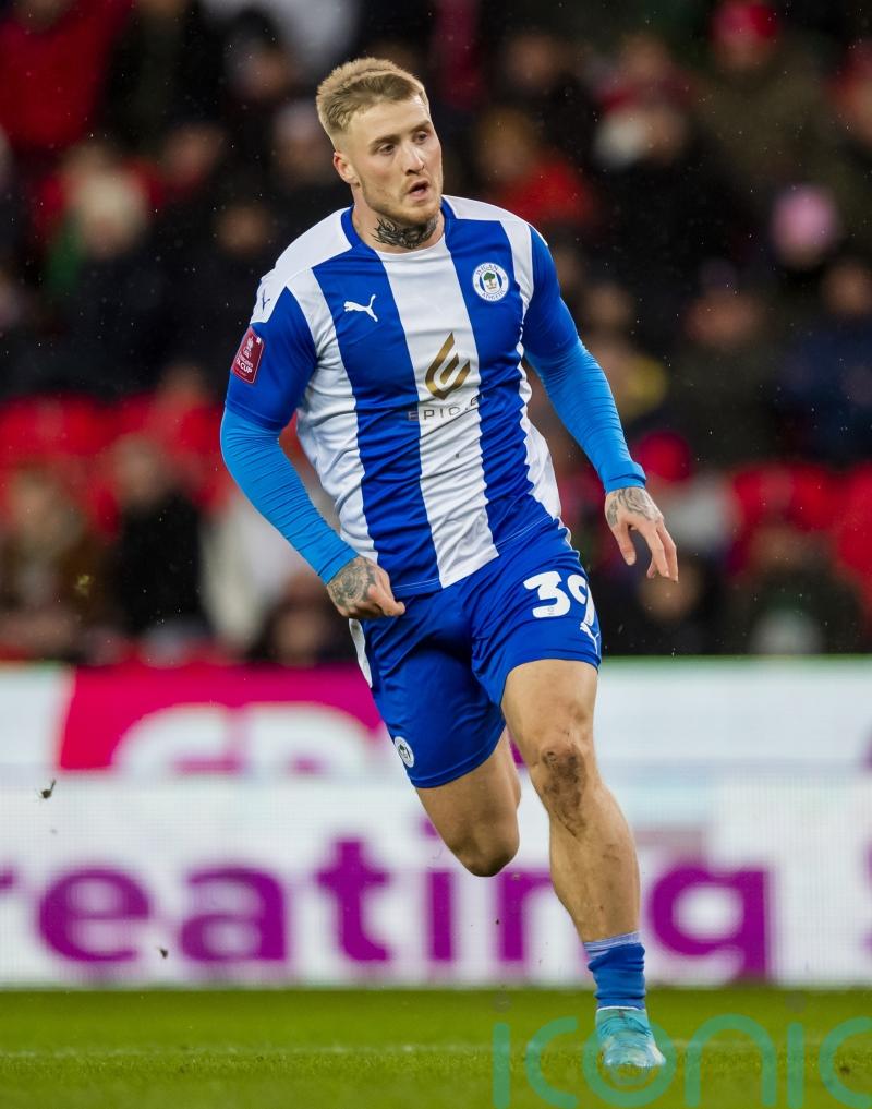 Wigan no longer on minus points after thrashing leaders Bolton