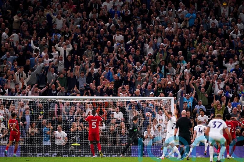 Tottenham claim dramatic last-gasp victory over nine-man Liverpool