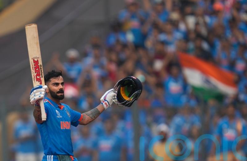 Virat Kohli hits record century as India post huge score in semi-final