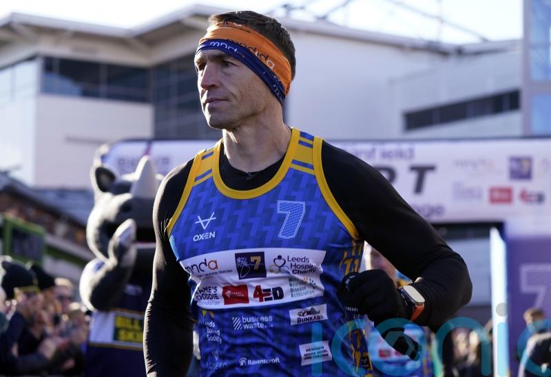 Kevin Sinfield greeted by Sir Gareth Edwards after latest fundraising challenge