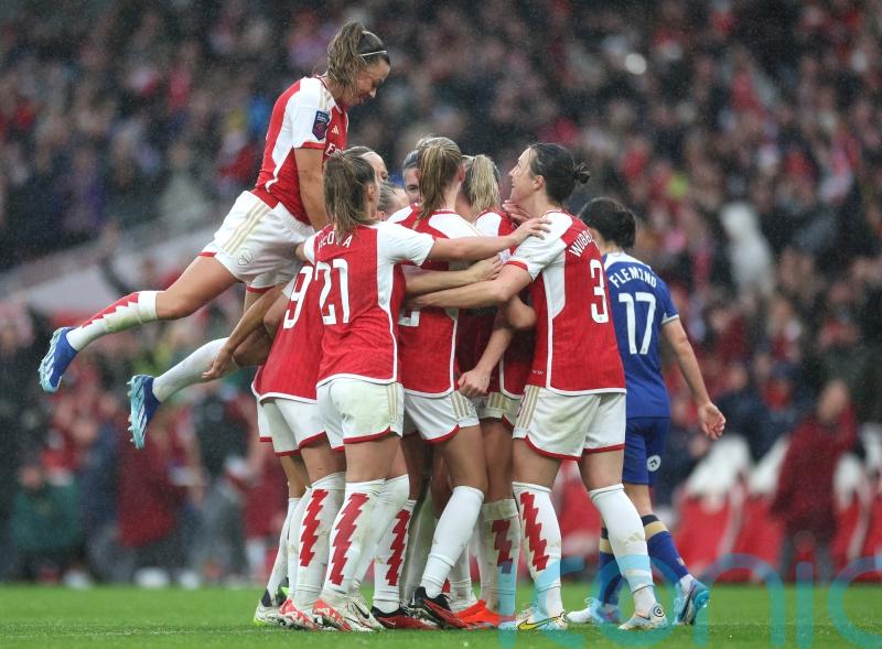 Arsenal join Chelsea at top of WSL after impressive win in front of record crowd