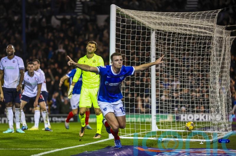 Portsmouth beat Bolton to go six points clear at League One summit