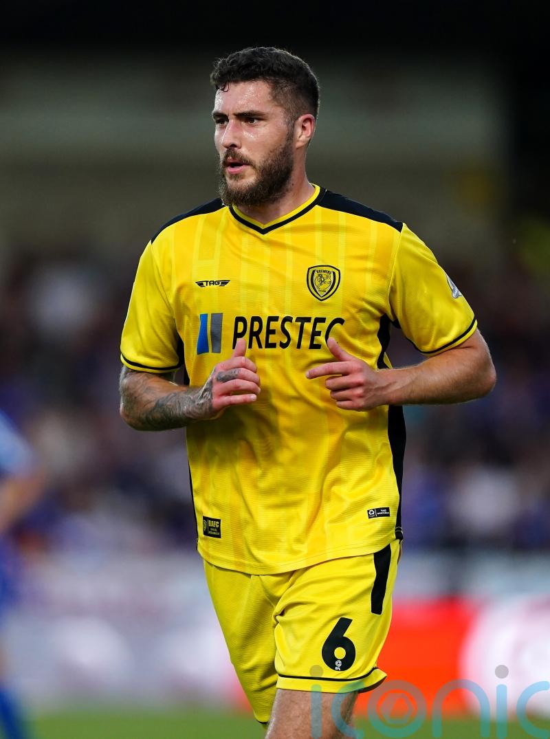 Managerless Burton salvage point at Charlton with last-gasp Ryan Sweeney goal