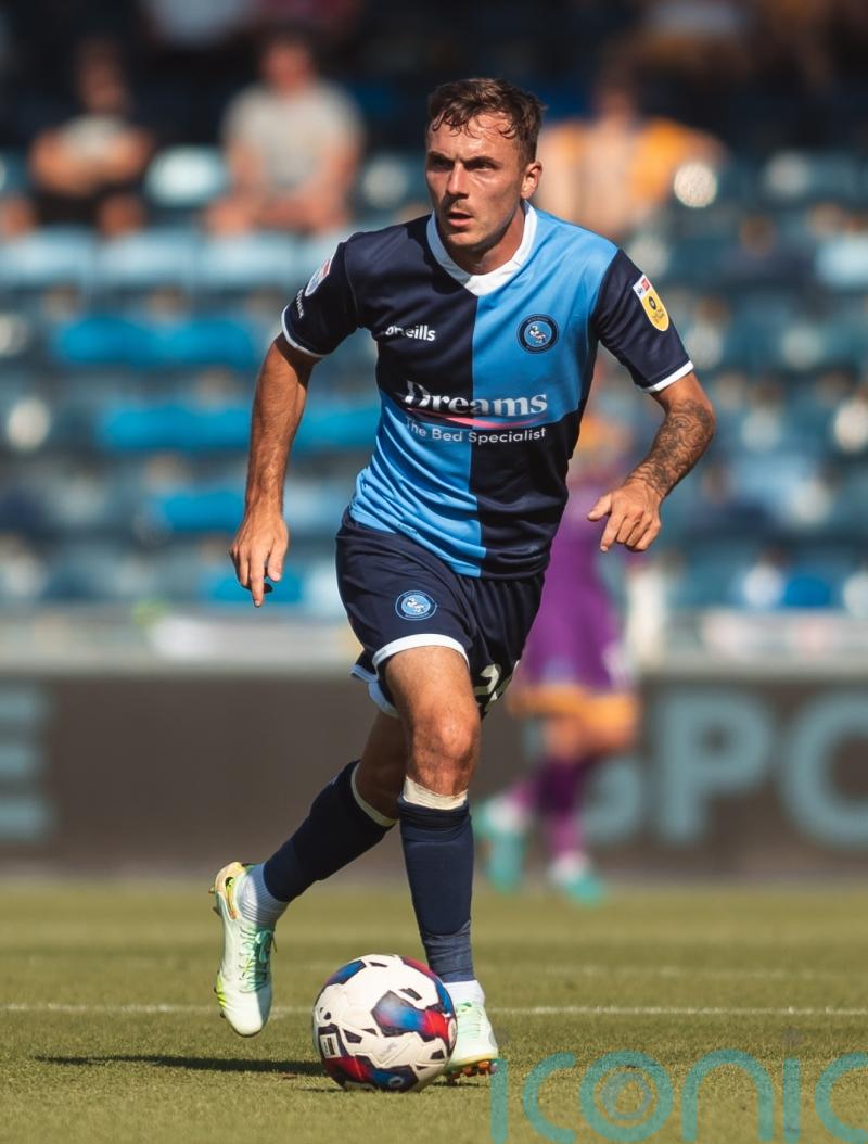 Ten-man Wycombe survive late Bristol Rovers fightback