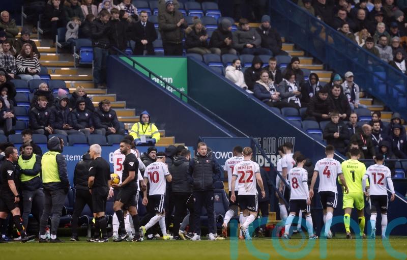 Bolton-Cheltenham abandoned after fan suffers suspected cardiac arrest