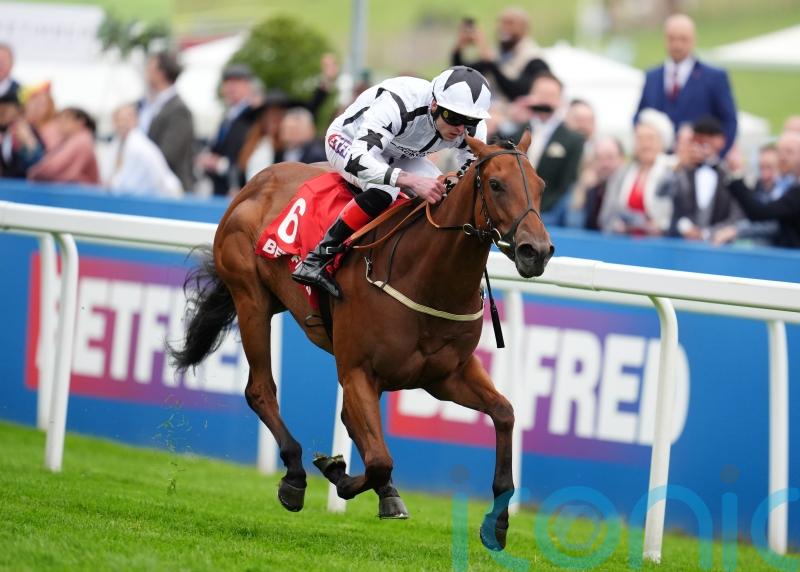 Teej A answers the call in Woodcote Stakes