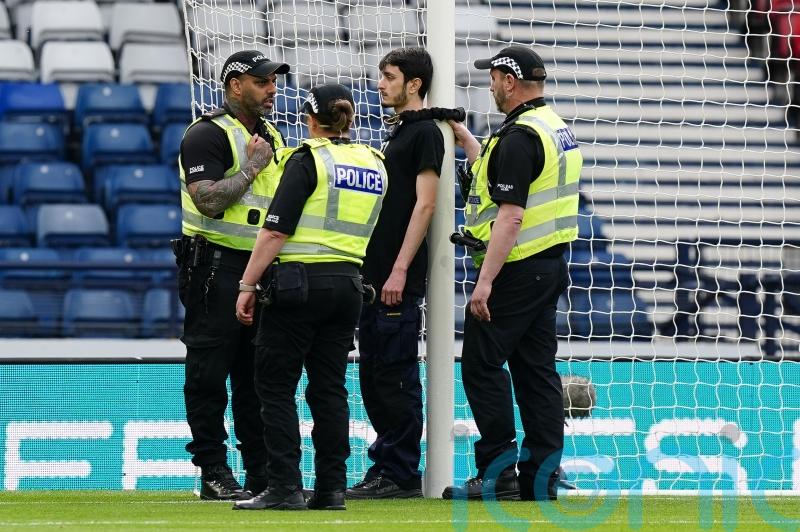 Protester ties themselves to Hampden goalpost to delay Scotland-Israel qualifier