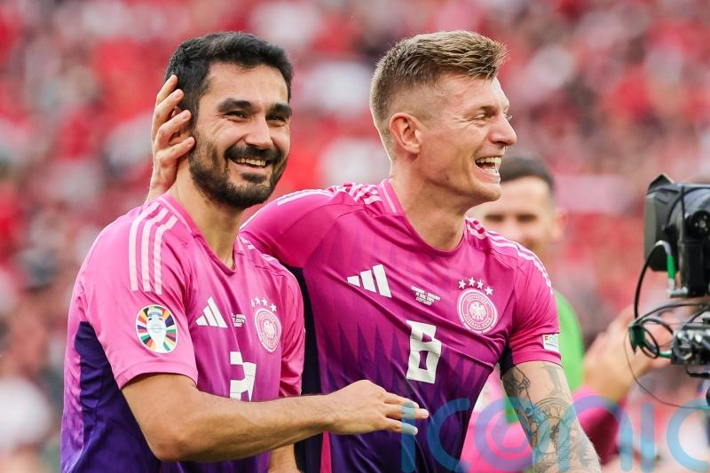 Germany reach last 16 as Scotland draw with Switzerland and Albania hold Croatia