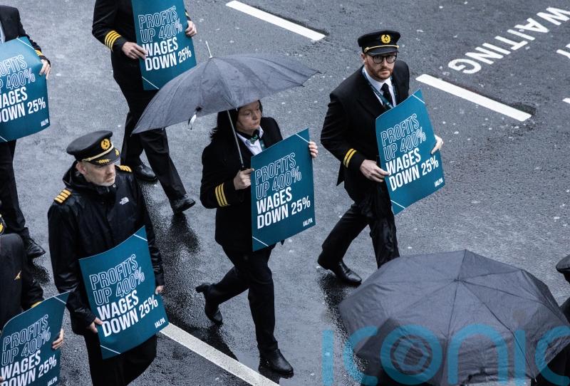 Aer Lingus pilots march around Dublin Airport during eight-hour strike