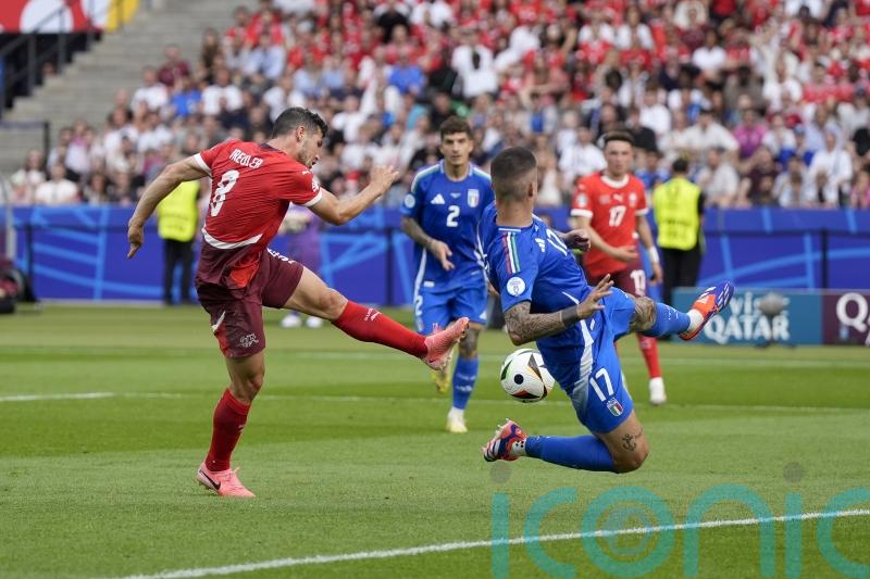Switzerland stun holders Italy to reach last eight of Euro 2024