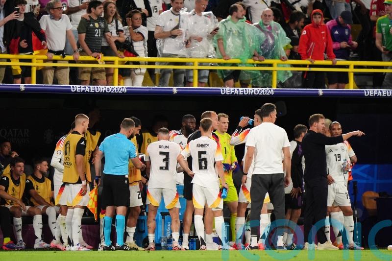 Germany v Denmark clash delayed for 24 minutes by thunder and lightning