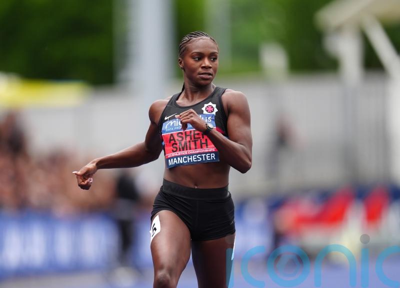 Dina Asher-Smith warms the crowd on a chilly day in Manchester