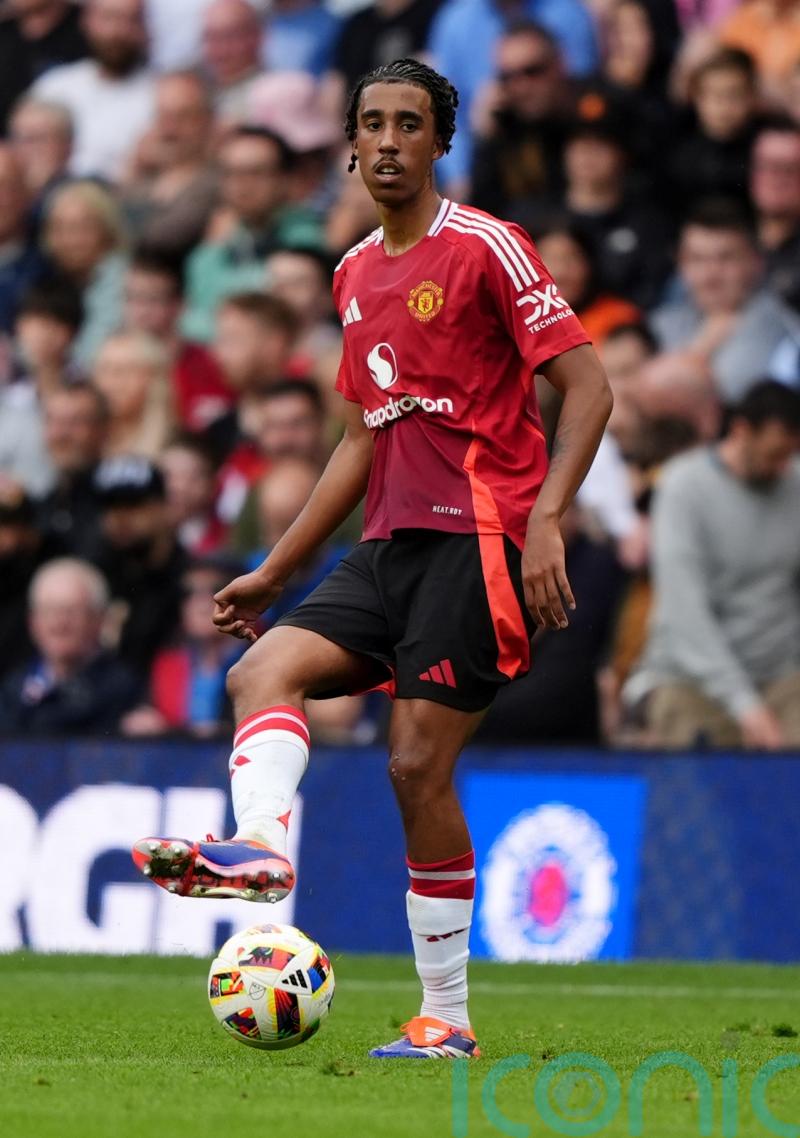 Manchester United defender Leny Yoro seen on crutches with left foot injury