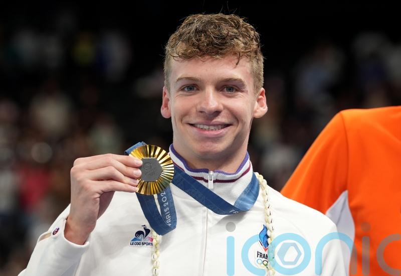 Leon Marchand is toast of Paris with astonishing Olympic double in the pool