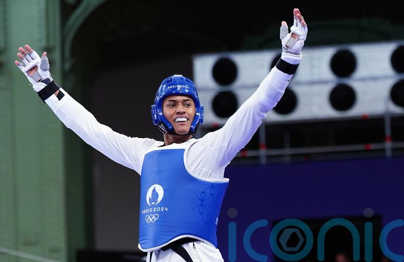 Caden Cunningham topples world champion to reach Olympic final