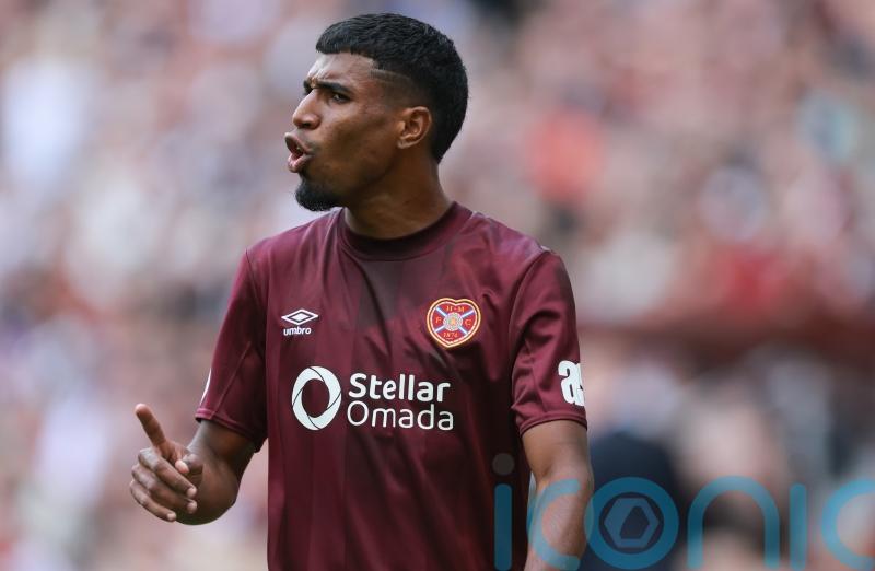 Dundee coast to victory over Hearts to go top of fledgling table