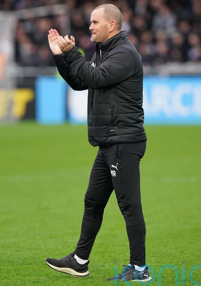 Mark Robinson raises a glass to his Brewers for taking a point from Rotherham