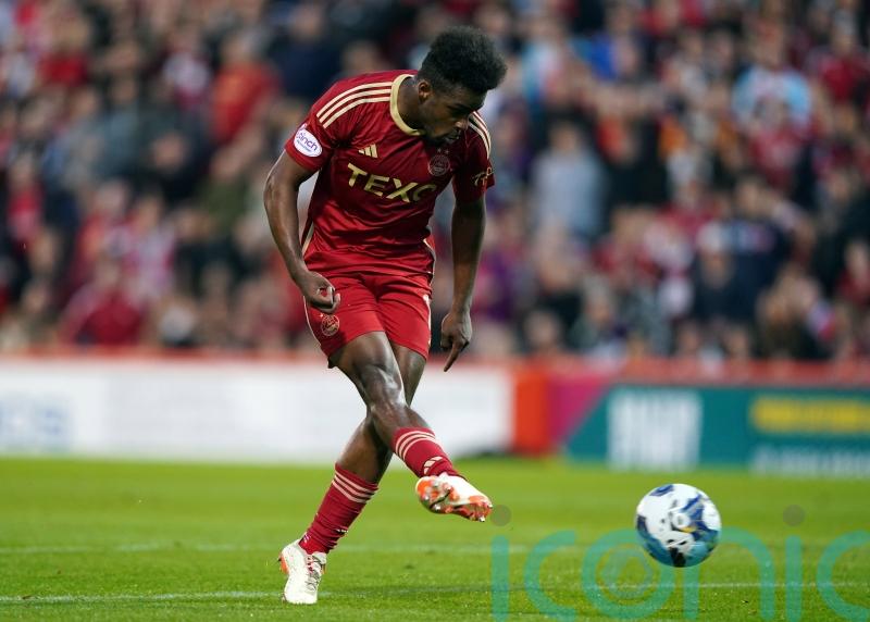 Duk stars as Aberdeen battle past Hearts to maintain perfect start to season