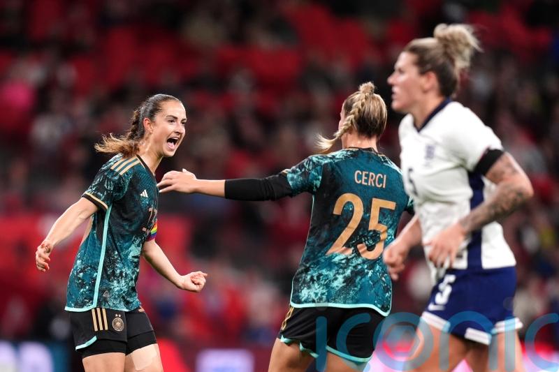 England beaten by Germany in chaotic Wembley friendly