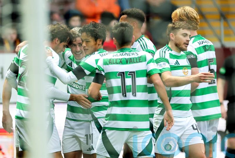 Celtic cruise to comfortable win at Motherwell to return to Premiership summit